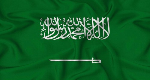 Realistic Saudi Arabia flag waving. Close up of flag of Saudi Arabia with cloth texture