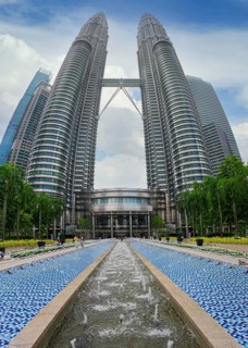 Petronas twin towers with fountains, Kuala Lumpur, Malaysia, Asia