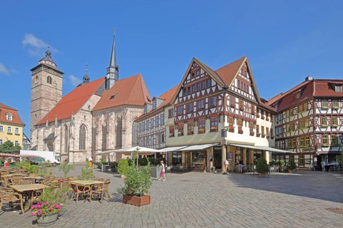 Late Gothic St George's Church and half-timbered houses with pedestrians, Altmarkt, Schmalkalden,