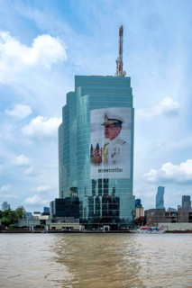 Tower block National Telecom Public Company Limited with image of Thailand King Maha
