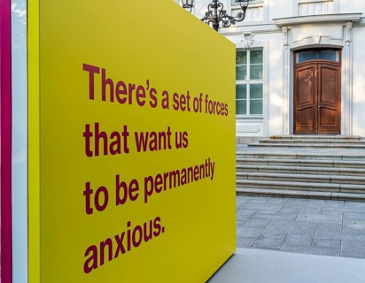 Tony Cokes, visual artist and educator, display panel at the Palais Populaire Unter den Linden,