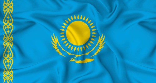 Realistic Kazakhstan flag waving. Close up of flag of Kazakhstan with cloth texture