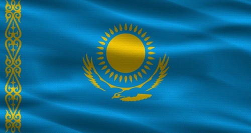 Kazakhstan flag with fabric texture. Realistic flag of Kazakhstan waving