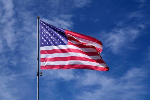 US flag, national flag USA, flies over National Guard memorial, memorial for US soldier Sgt. Frank