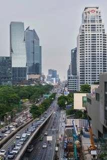 Road traffic and HSBC building, Bangkok, Thailand
