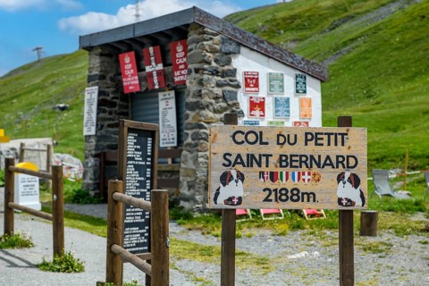 Sign in French with the inscription Col du Petit Saint Bernard and altitude 2188 metres at the top