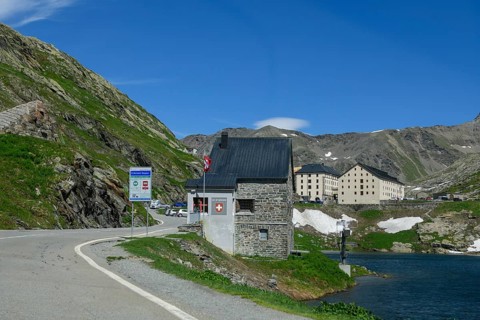 View of historic Swiss border building in the foreground Former passport control checkpoint
