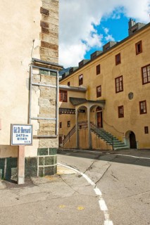 View around the corner from left Auberge de Grand Saint Bernard hostel right historic Hospice