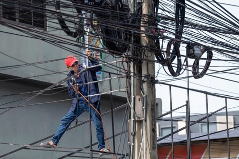 Craftsman welding metal rods, Bangkok, Thailand