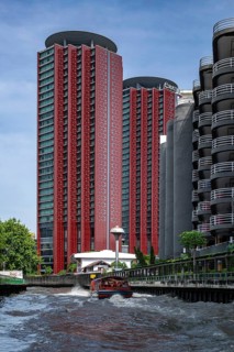 High-rise building on the canal, Bangkok, Thailand