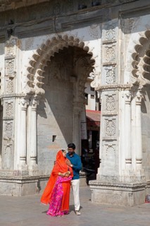 Indian couple at Gangaur Ghat or Gangori Ghat, Udaipur, Rajasthan, India