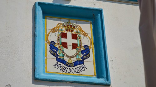 Coastguard, Italian tile coat of arms on a wall with crown and cross motif, Agia Marina, Leros,
