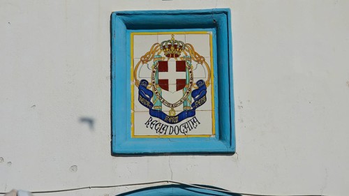 Coastguard, Decorative coat of arms on tiled wall in blue and white tones, Agia Marina, Leros,