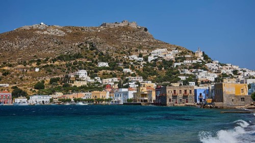 Panteli Fortress, Hilly coastal town with densely built blue and white houses, Agia Marina, Leros,