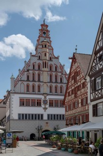 Historic town hall, built in 1426, historic half-timbered houses on the right, Bad forest lake,