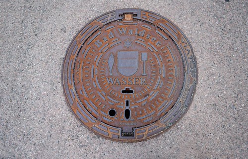 Municipal manhole cover of the city of Bad forest lake with city coat of arms, Bad forest lake,