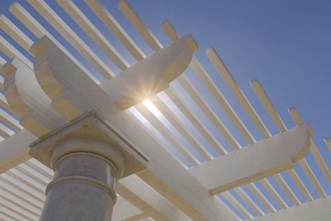 Detail abstract of A beautiful marble and wood pergola patio cover