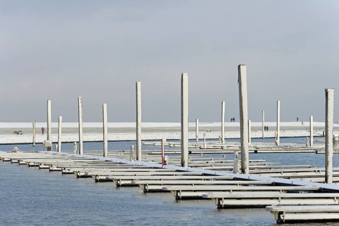 Winter day, onset of winter, snow on the jetties in the marina, North Sea, Norddeich, Lower Saxony,