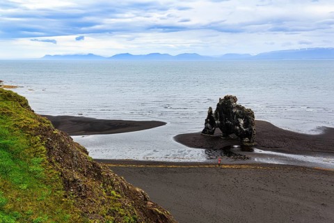 Basalt rock Hvitserkur, famous Elephant Rock on the lava beach, coastline, Vatnsnes peninsula,