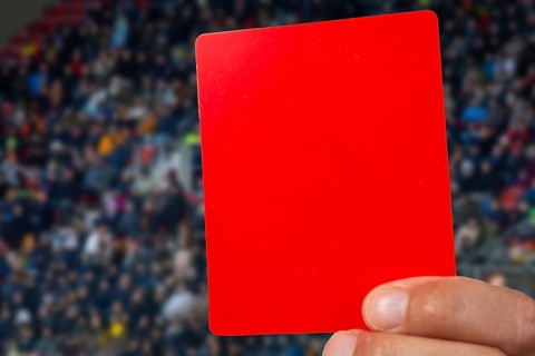 (Photomontage) Red card at a football match