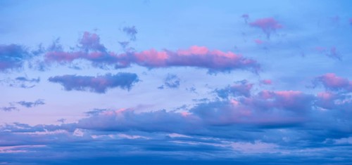 Background image for sky replacement, evening sky with pink clouds at dusk after sunset