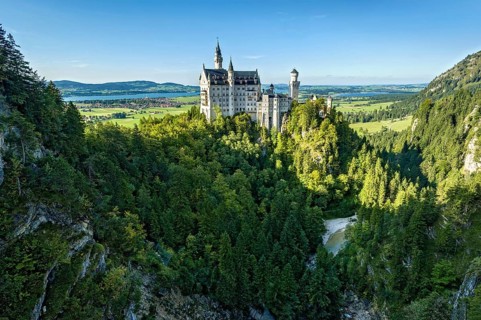 Neuschwanstein Castle by King Ludwig II above the Pöllat Gorge, fairytale castle in the