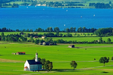 View from Neuschwanstein Castle to the pilgrimage church of St Coloman, Forggensee, Schwangau,
