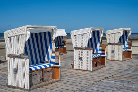 Beach chairs on wooden planks, Sankt Peter Ording, Eiderstedt, North Frisia, North Sea,