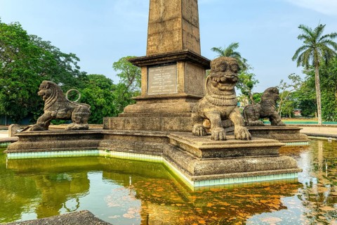 Independence Memorial Hall in Cinnamon Gardens, Lions on the Commemorative water basin in the honor