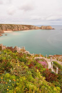 Minack Theatre, spectacular open-air theatre, circular path with lush planting, South England