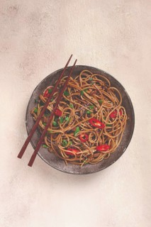 Udon noodles, with shimeji mushrooms, vegetables, in sauce, with sesame seeds, green onions, Asian
