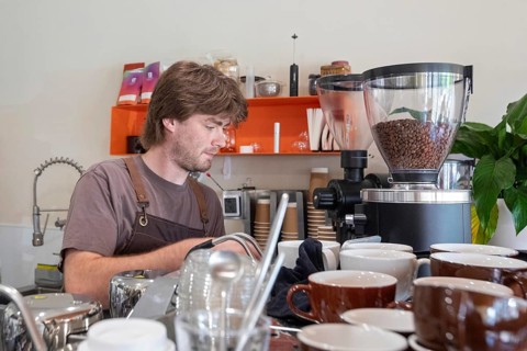 Midland, Michigan - An employee makes coffee at Chef Sergey's Bakery, a popular shop owned by four