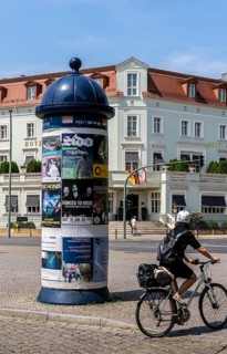 Advertising pillar designed in historical style. Potsdam, Brandenburg, Germany