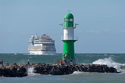 Cruise ship AIDA nova leaving, lighthouse, Warnow estuary, Baltic Sea, Warnemünde, Rostock,