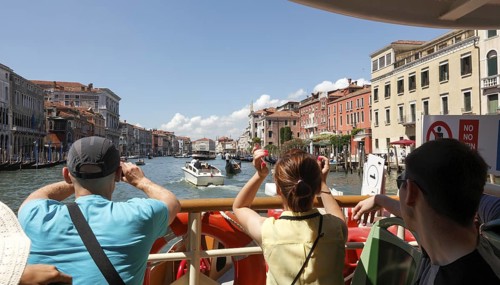View from the vaporetto onto the Grand Canal, Venice, Veneto, Italy