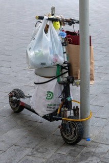 Electric scooter with bags, Abu Dhabi, United Arab Emirates