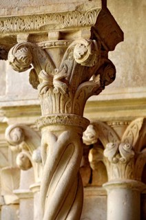 Slender Gothic columns with filigree capitals in the cloister, Gothic basilica of the Cistercian
