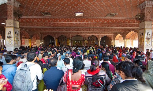 Devout Indians at the Govind Dev Ji Hindu temple in the old city centre, Jaipur, Rajasthan, India