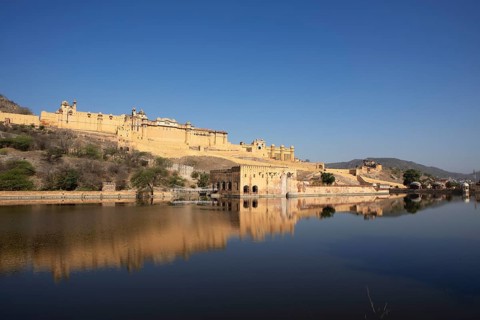 Amber Fort or fortress at Maota Lake on the Aravalli hill range, reflection in the water, Jaipur,