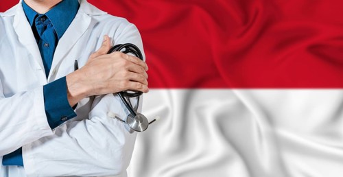 Doctor with stethoscope on Monaco flag. Doctor holding stethoscope on Monaco flag