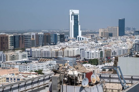 Residential neighbourhood rooftop with satellites, Abu Dhabi, United Arab Emirates