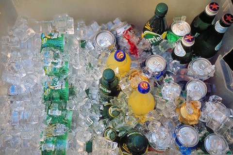 Drinks box filled with ice cube cubes in a bar, New York, City, USA
