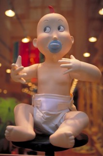 Baby mannequin in a baby equipment shop, New York City, USA