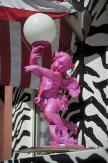 Angel as a lamp figure in front of a house entrance, New York City, USA