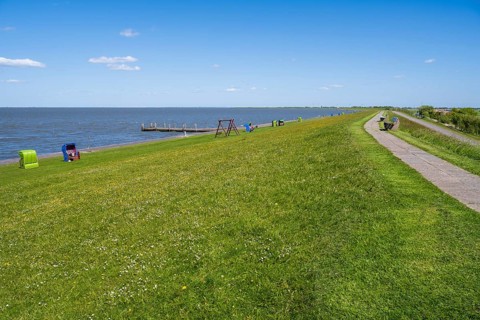 Beach chairs on the dyke, Pellworm Island, North Frisia, North Sea, Schleswig-Holstein, Germany