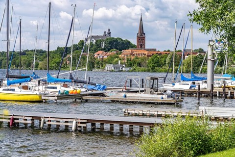 Sailing school on the GroÃŸer Plöner See, Nikolai Church and Plön Castle in Plön,