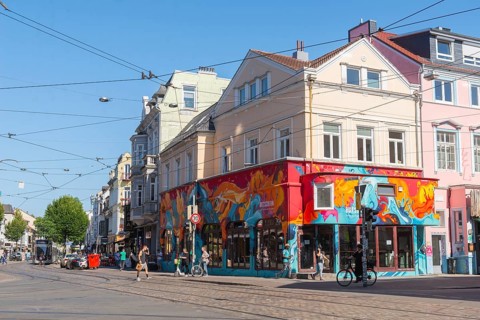 Ostertorsteinweg shopping street in the Ostertor district, car traffic, tram, bicycles, wide