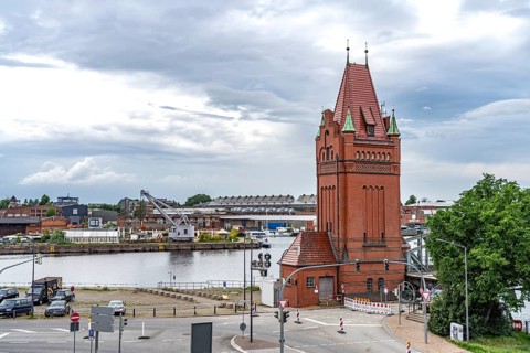 Bridge tower of the lift bridge and the Trave, Hanseatic City of LÃ¼beck, Schleswig-Holstein,