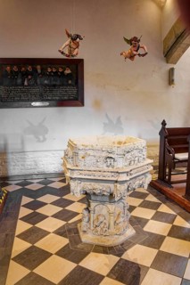 Baptismal font, sandstone baptismal font from the Renaissance period from 1603, created by H.