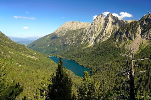 Lake Estany de Sant Maurici and the Els Encantats mountain range in the AigÃ¼estortes i Estany de